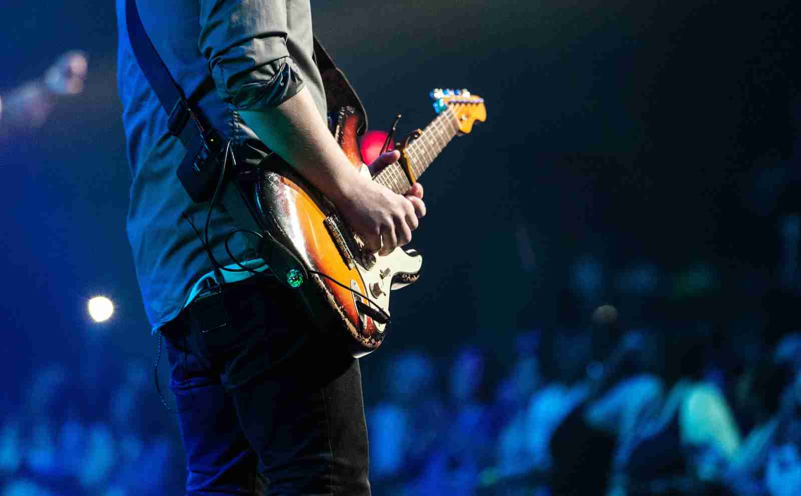 a man playing a guitar